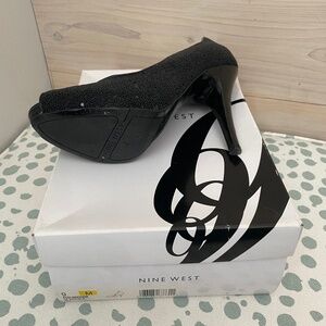 Open toe high heel shoe